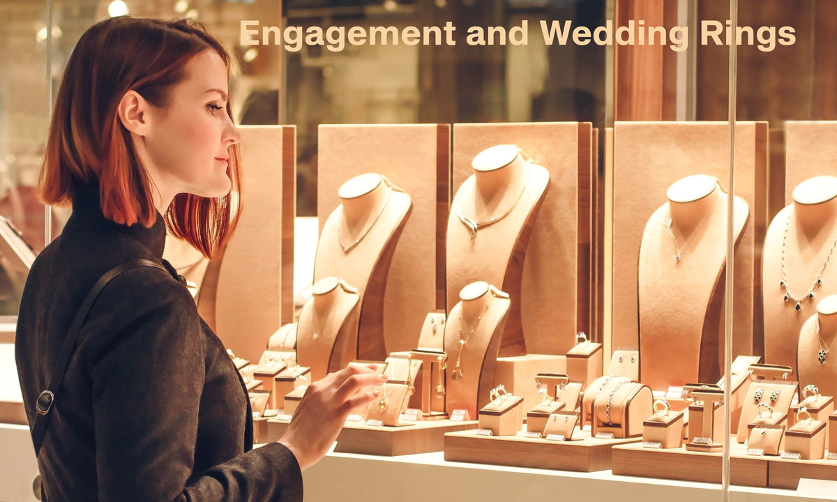 woman looking through window at jewelry
