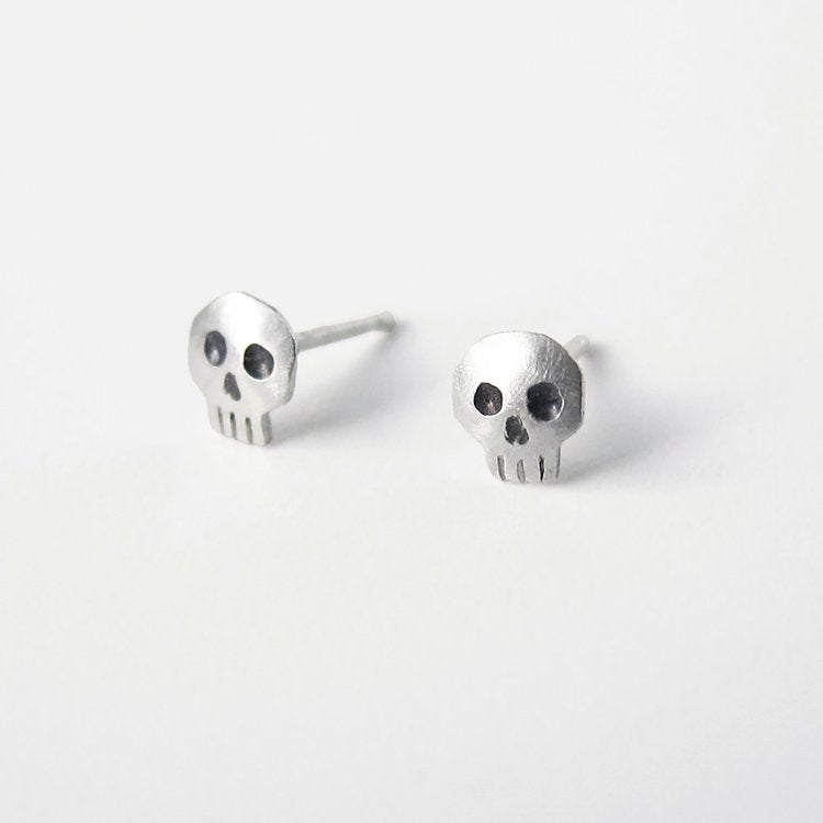 Tiny skull studs, sterling silver