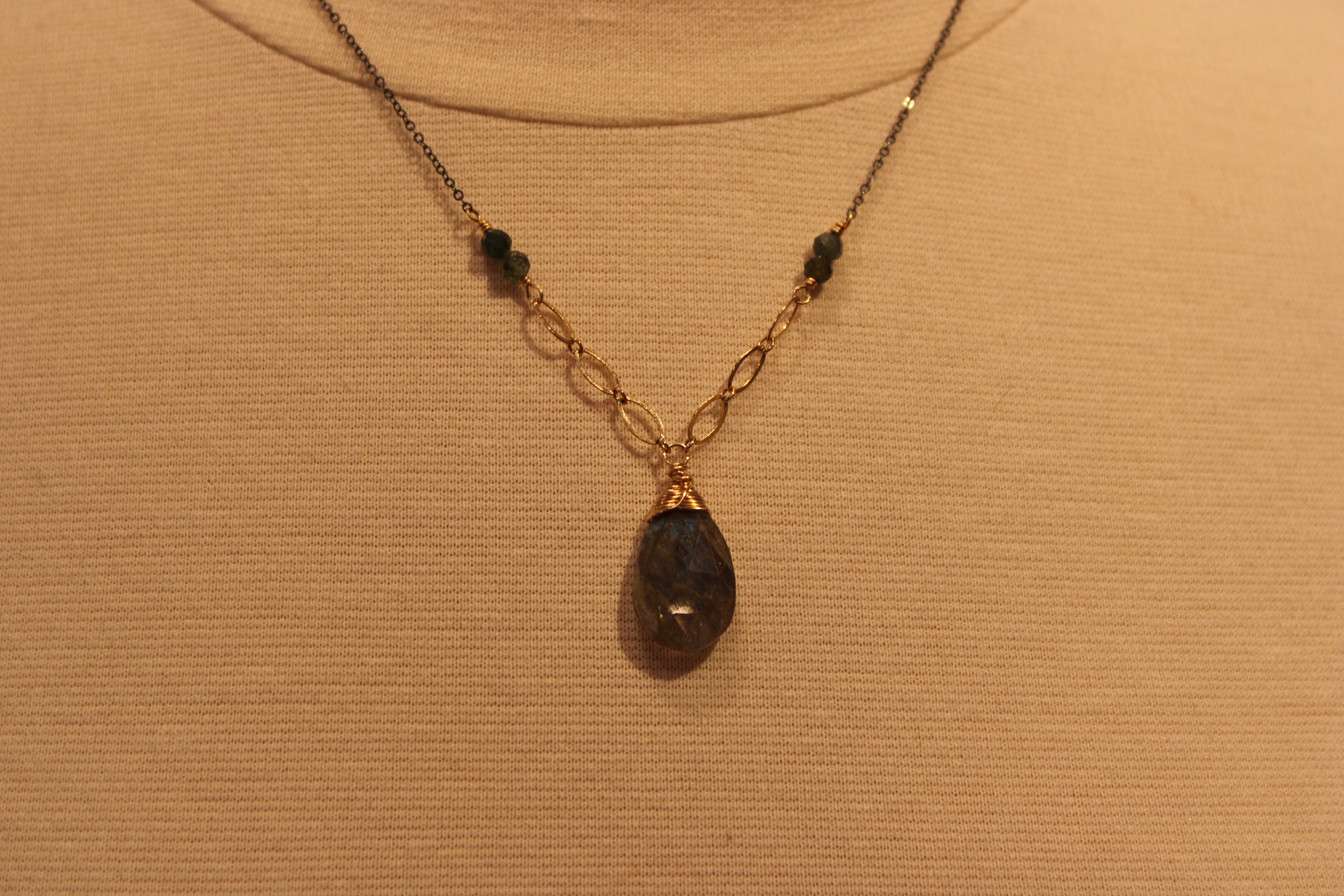 Large Labradorite with Small Aquamarines