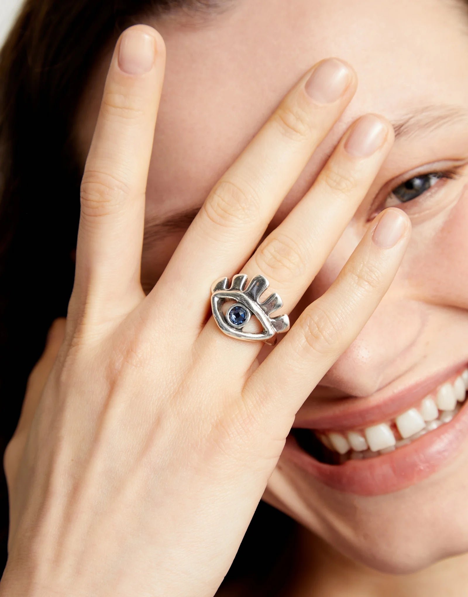 Eye-Shaped Ring with Faceted Blue Crystal